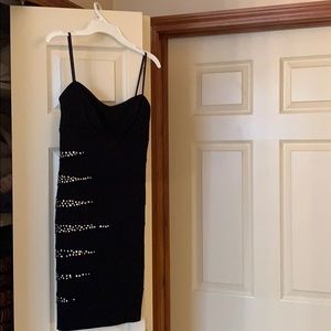 Black dress with studs going down one side